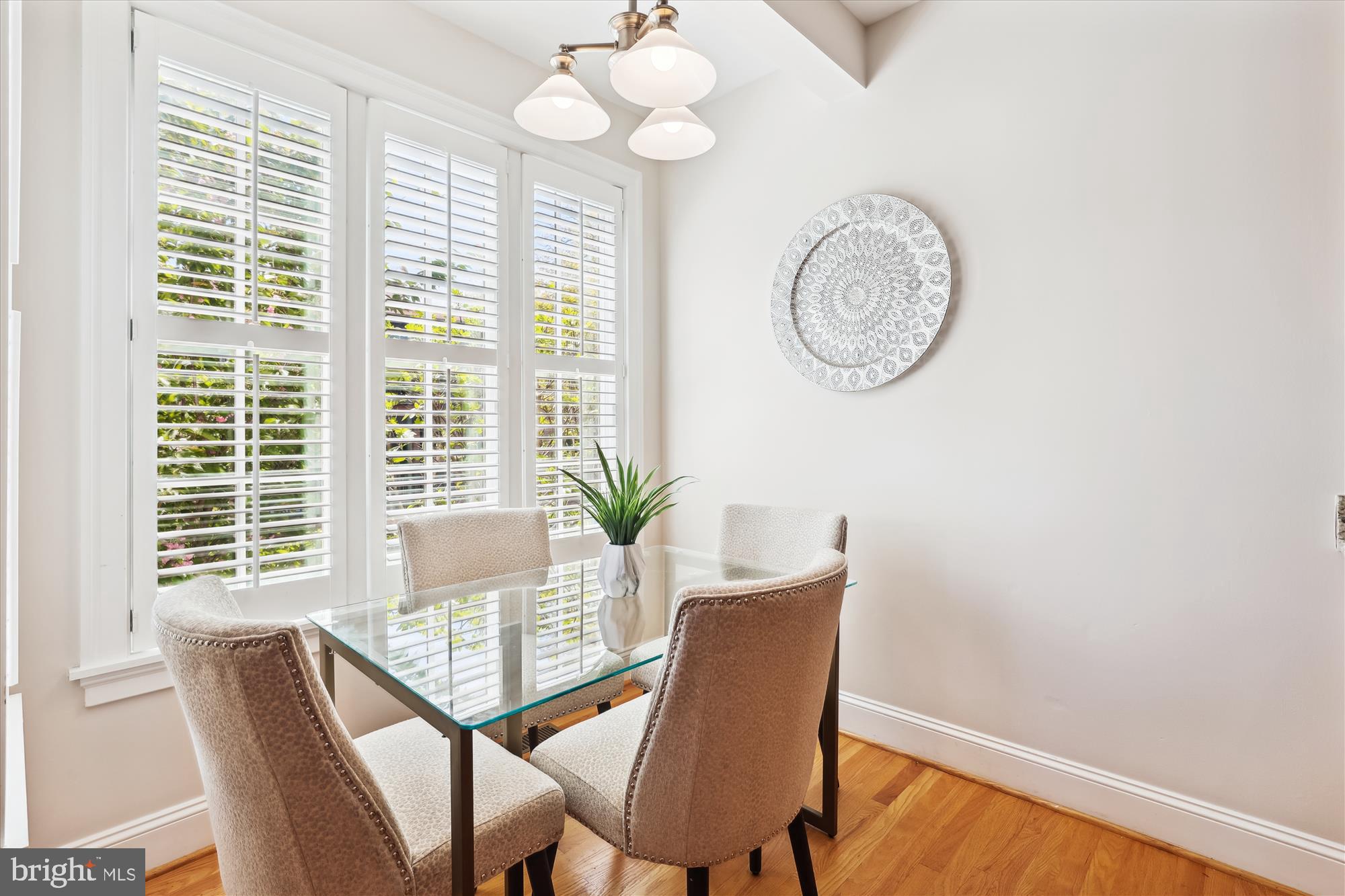 229 Locust Street Southeast, Unit 3 Vienna, VA 22180 - Photo 15 of 57 a view of a dining room with furniture window and wooden floor