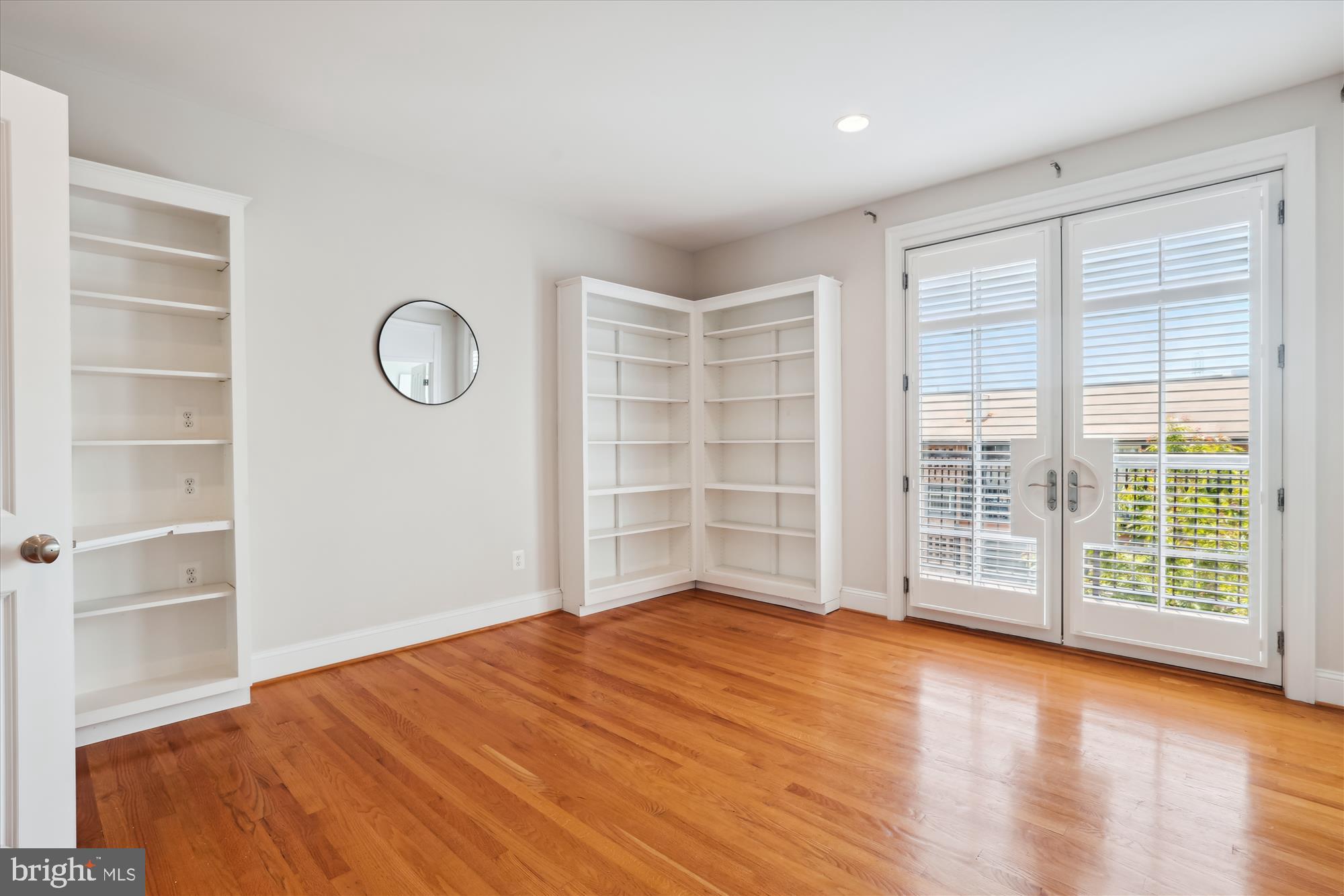 229 Locust Street Southeast, Unit 3 Vienna, VA 22180 - Photo 19 of 57 a view of a livingroom with wooden floor and a window