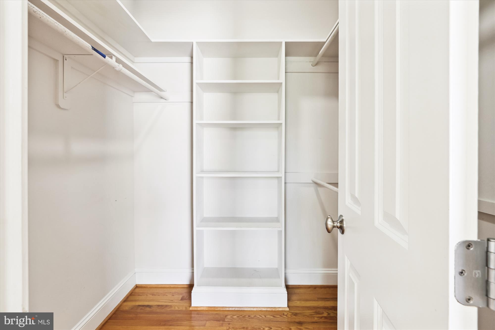 229 Locust Street Southeast, Unit 3 Vienna, VA 22180 - Photo 22 of 57 a view of walk in closet with empty racks