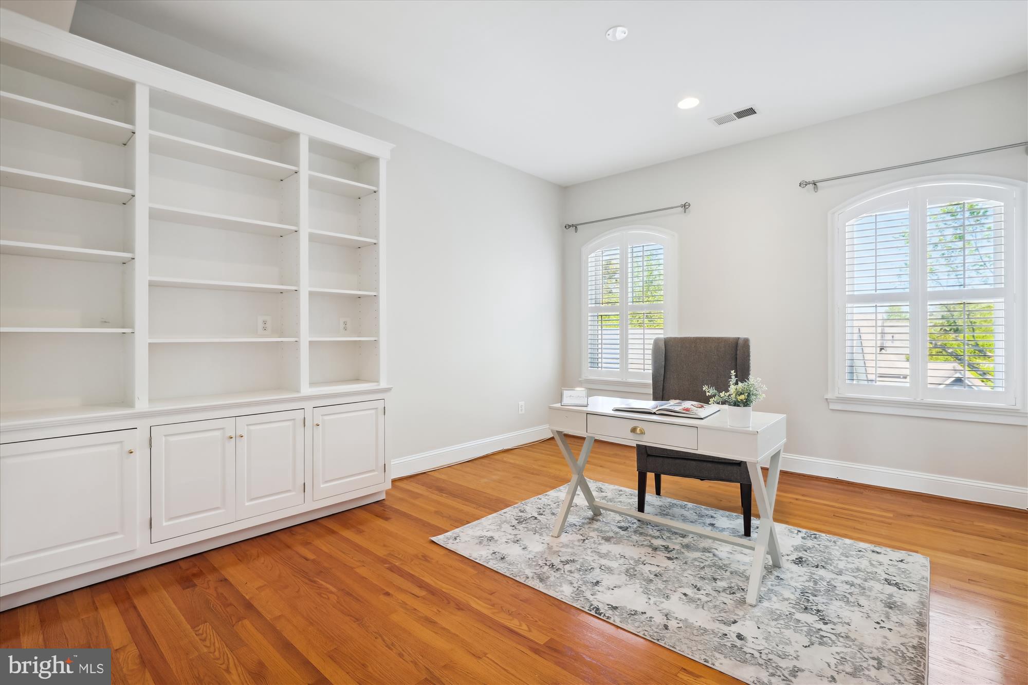 229 Locust Street Southeast, Unit 3 Vienna, VA 22180 - Photo 40 of 57 a workspace with wooden floor and a window