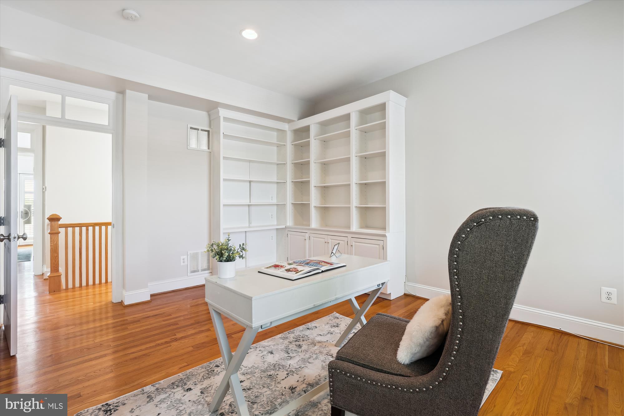 229 Locust Street Southeast, Unit 3 Vienna, VA 22180 - Photo 41 of 57 a view of a livingroom with furniture and wooden floor