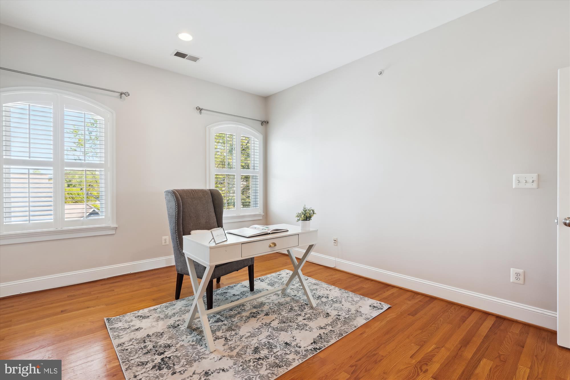 229 Locust Street Southeast, Unit 3 Vienna, VA 22180 - Photo 43 of 57 a workspace room with furniture and wooden floor