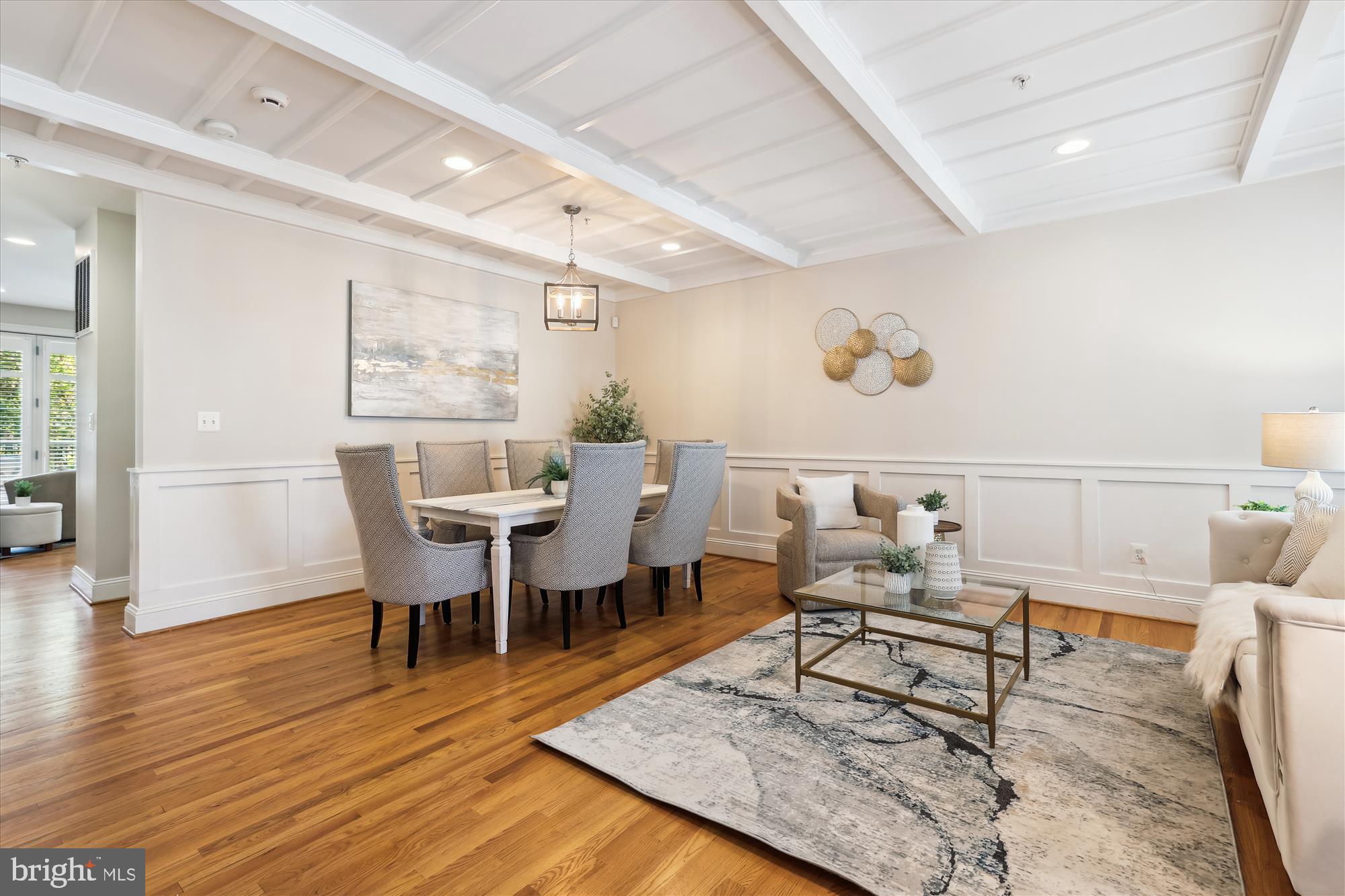 229 Locust Street Southeast, Unit 3 Vienna, VA 22180 - Photo 5 of 57 a living room with furniture and wooden floor