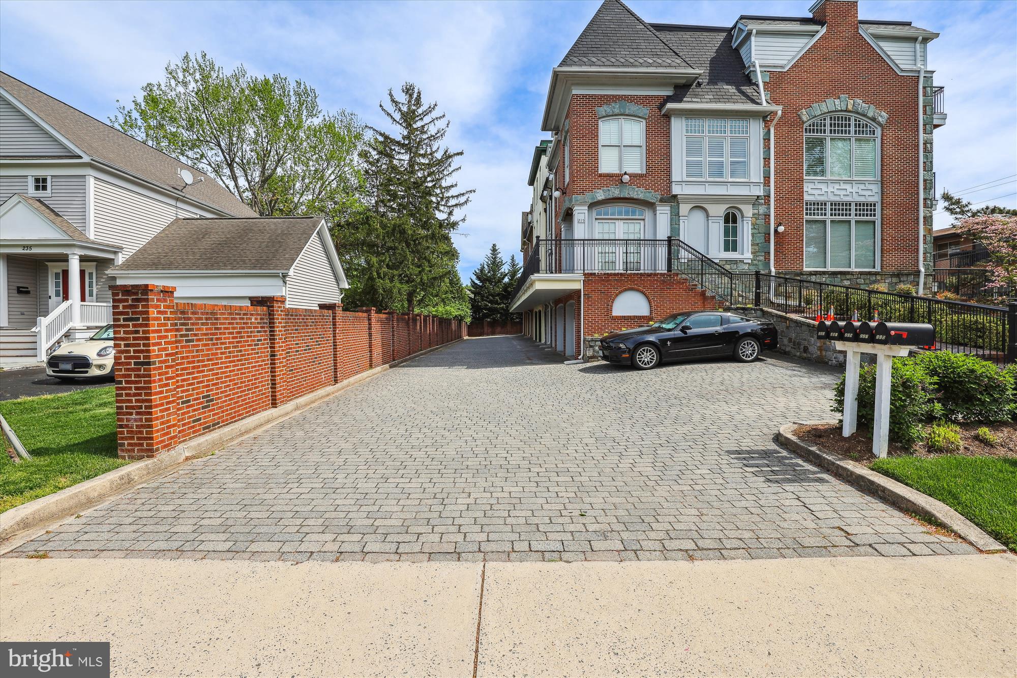 229 Locust Street Southeast, Unit 3 Vienna, VA 22180 - Photo 51 of 57 a front view of a house with a yard