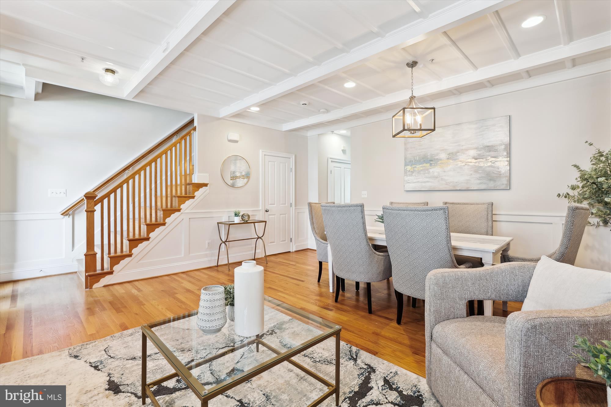 229 Locust Street Southeast, Unit 3 Vienna, VA 22180 - Photo 6 of 57 a view of a dining room with furniture a rug and wooden floor