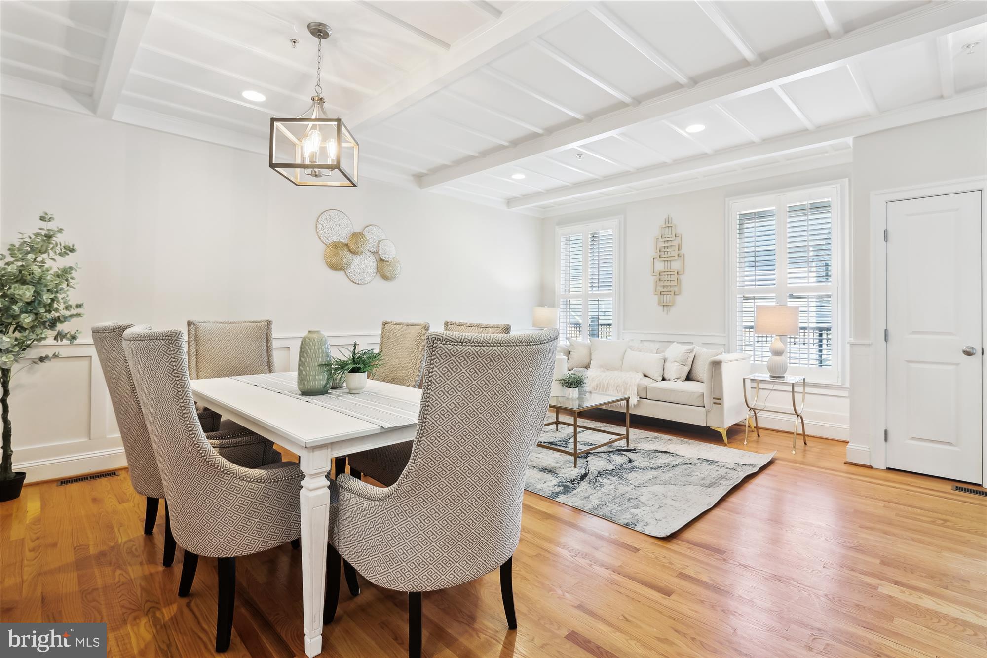 229 Locust Street Southeast, Unit 3 Vienna, VA 22180 - Photo 7 of 57 a view of a dining room with furniture wooden floor and chandelier