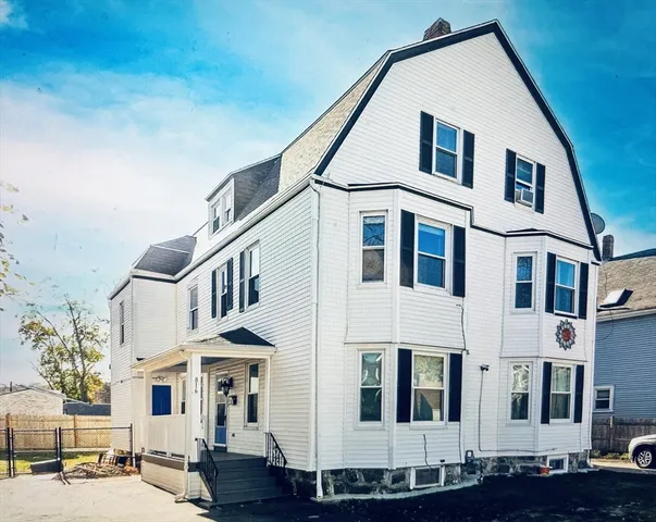 a front view of residential houses with street