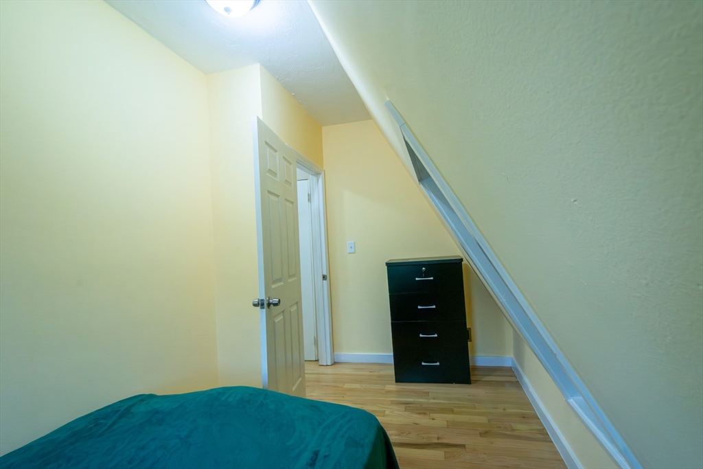 816 River Street, Unit 1 Boston, MA 02136 - Photo 13 of 16 a view of a hallway with closet and bedroom