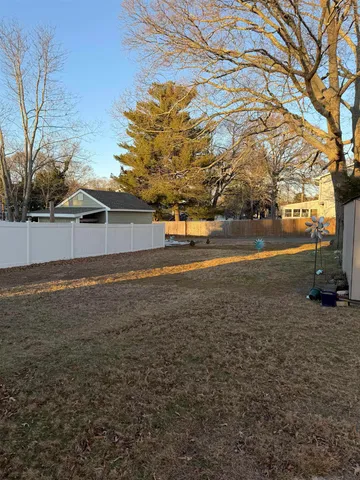 a view of a yard with an outdoor space