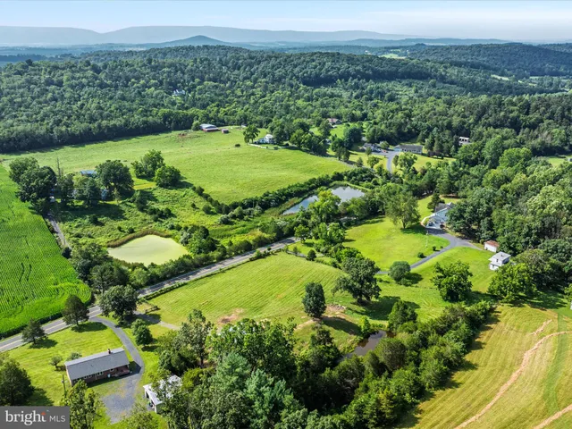 an aerial view of a golf course with a garden