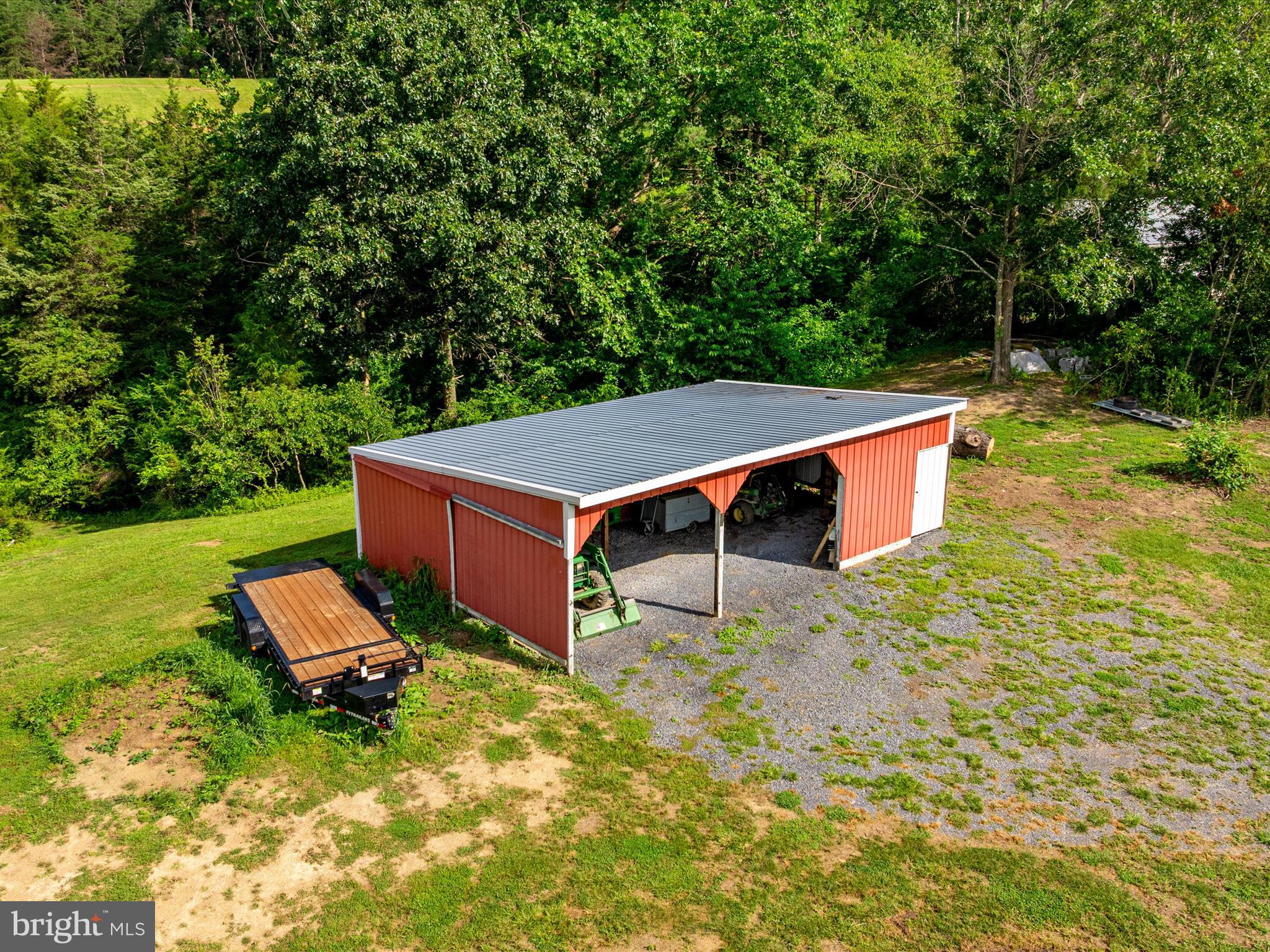 Senedo Mount Jackson, VA 22842 - Photo 7 of 16 a backyard of a house with yard and outdoor seating