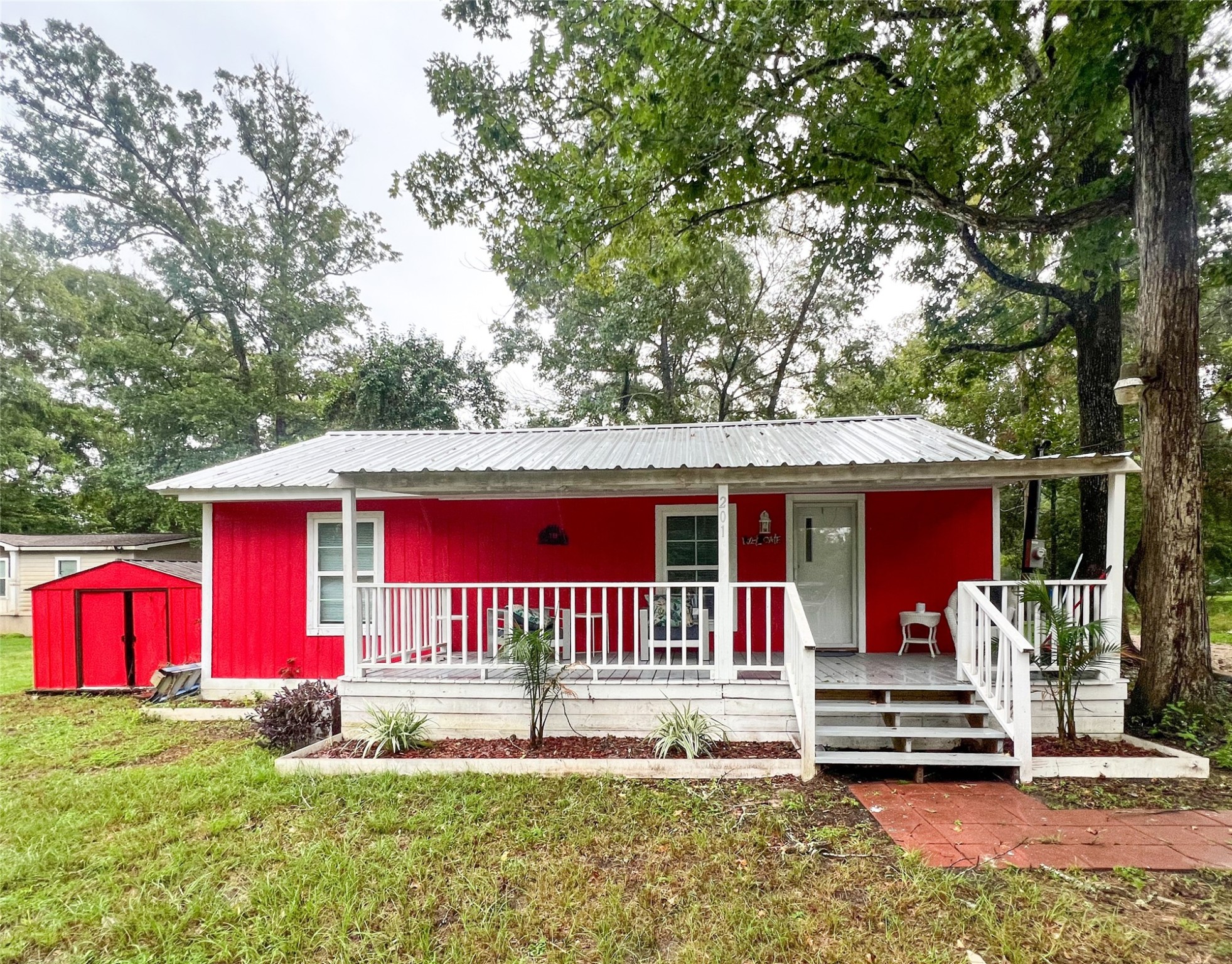 a view of house with outdoor seating