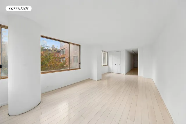 an empty room with windows