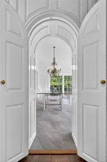 a view of entryway with livingroom