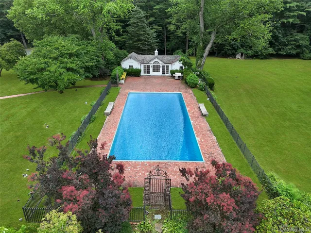 a view of swimming pool with a patio