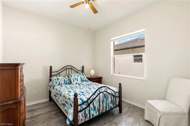 a utility room with sink dryer and washer