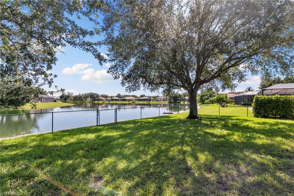860 Grand Rapids Boulevard Naples, FL 34120 - Photo 28 of 44 a view of a garden with trees