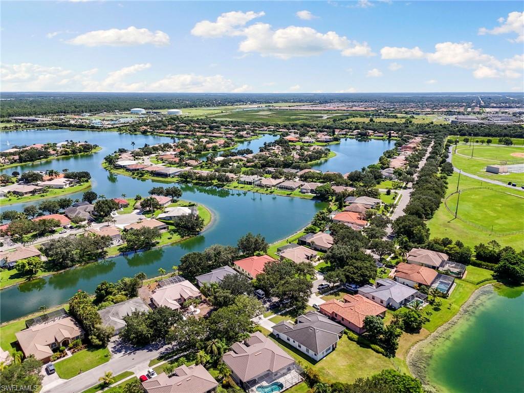 860 Grand Rapids Boulevard Naples, FL 34120 - Photo 41 of 44 a view of a city with lake