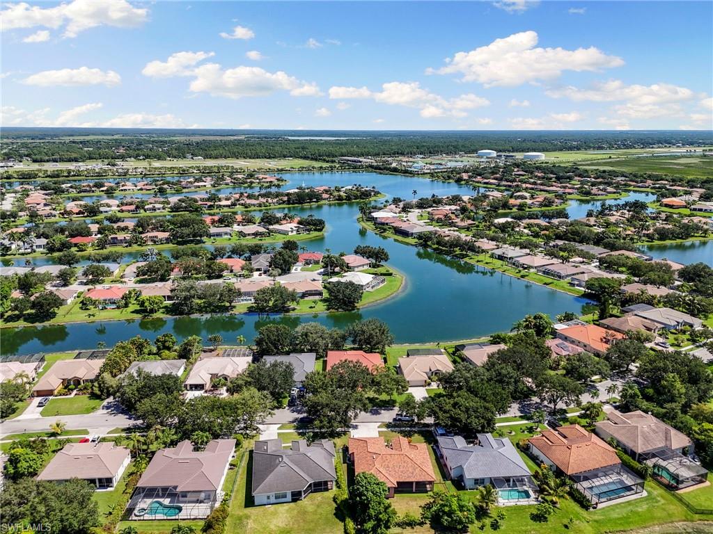 860 Grand Rapids Boulevard Naples, FL 34120 - Photo 42 of 44 an aerial view of residential houses with outdoor space