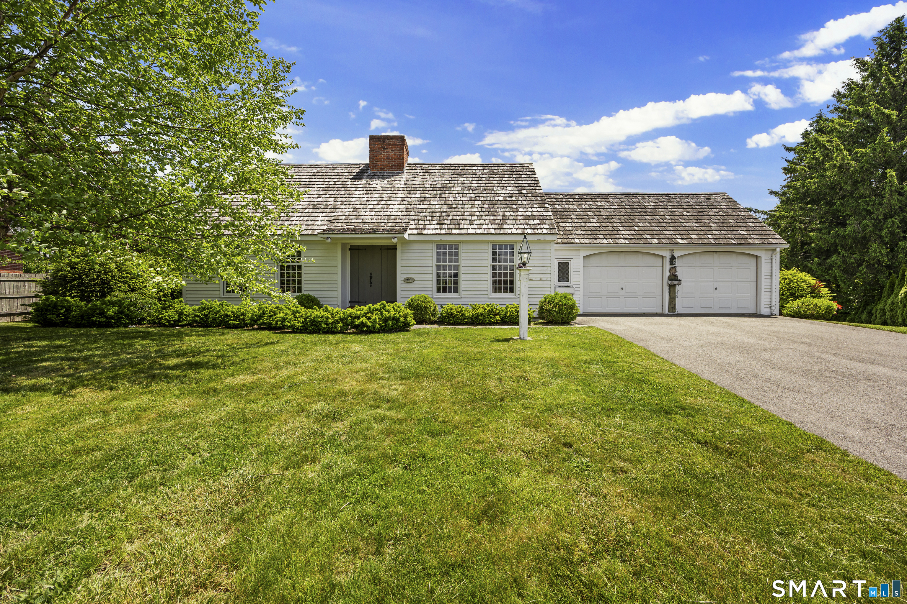 52 Susan Lane Meriden, CT 06450 - Photo 1 of 28 a front view of a house with garden