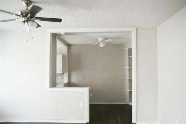 a bathroom with a mirror and a shower