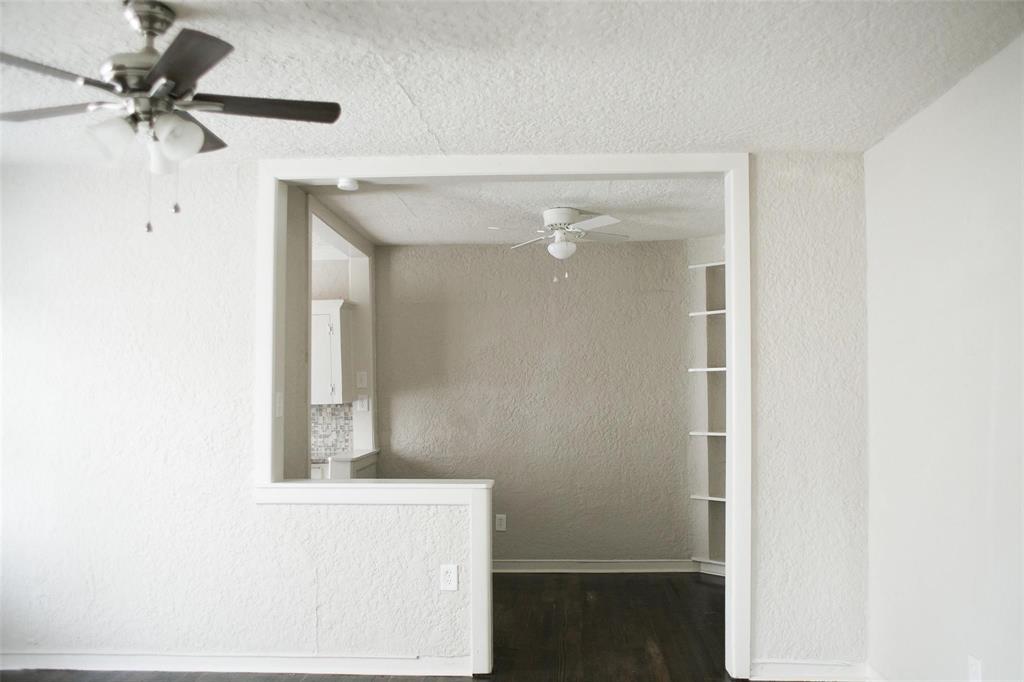 4107 Herschel Avenue, Unit 9 Dallas, TX 75219 - Photo 5 of 9 a bathroom with a mirror and a shower