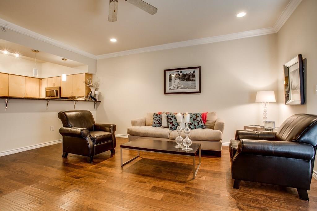 3102 Kings Road, Unit 3310 Dallas, TX 75219 - Photo 9 of 19 a living room with furniture and a flat screen tv