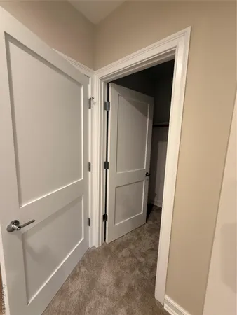 a bathroom with a glass door shower