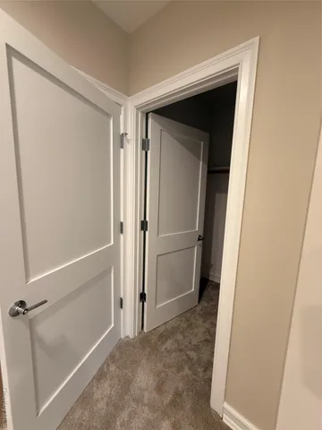 a bathroom with a glass door shower