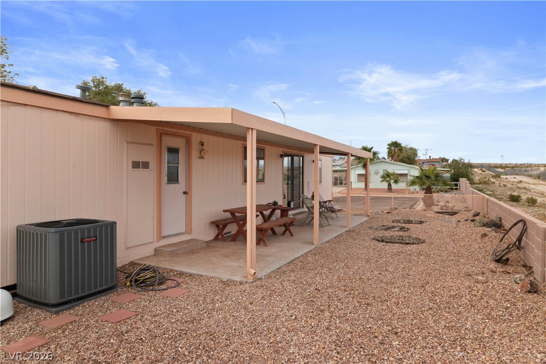 1609 Cajon Court Laughlin, NV 89029 - Photo 38 of 69 Rear view of property with a patio and a fenced backyard