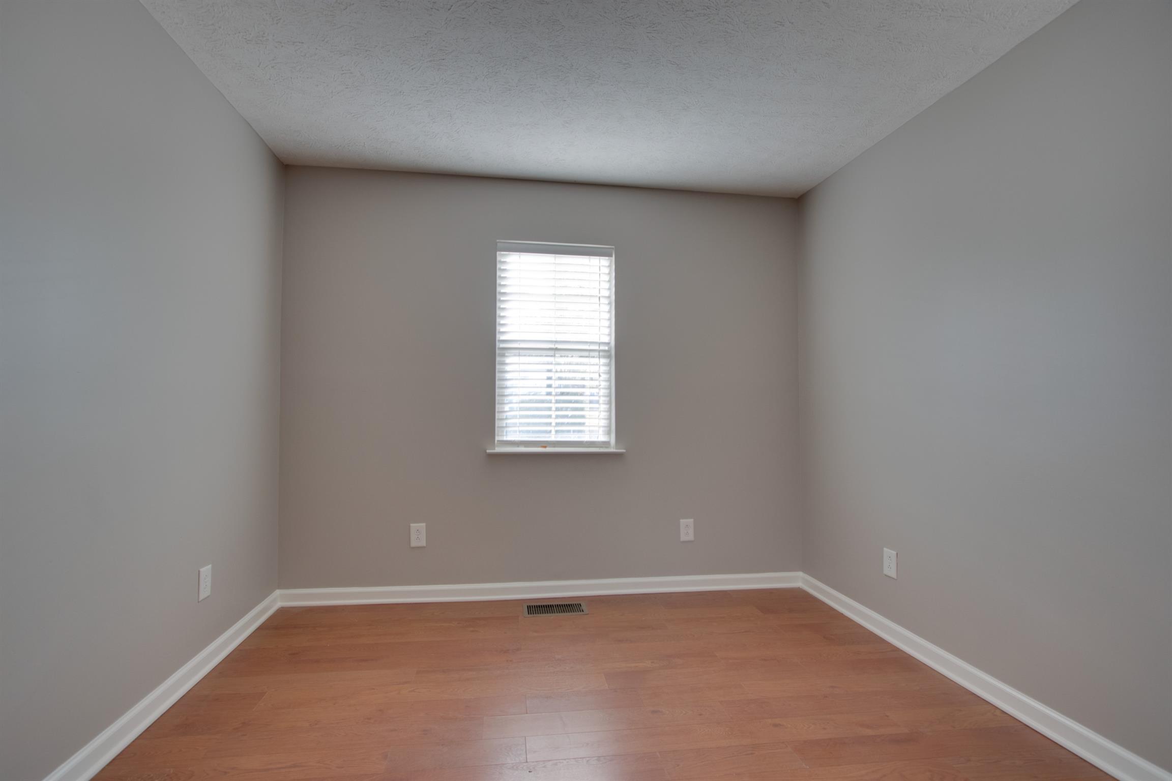 201 High Street Alexandria, TN 37012 - Photo 18 of 23 an empty room with a window