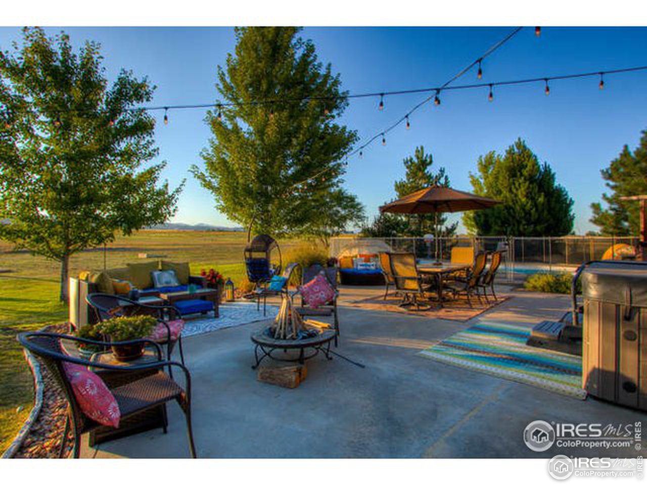 1441 Shelby Drive Berthoud, CO 80513 - Photo 12 of 40 a outdoor space with patio lots of furniture