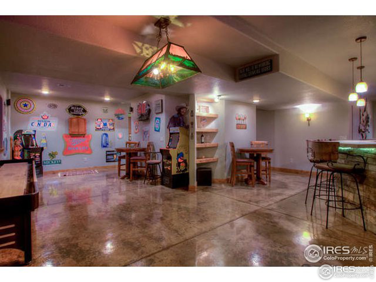 1441 Shelby Drive Berthoud, CO 80513 - Photo 32 of 40 a living room with lots of furniture and a large window