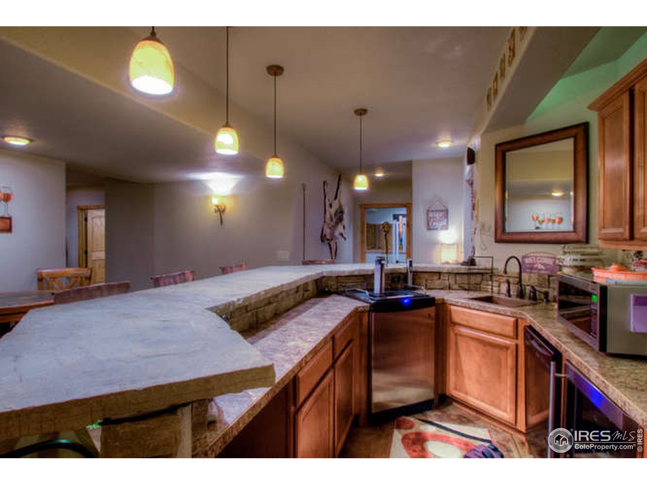 1441 Shelby Drive Berthoud, CO 80513 - Photo 34 of 40 a kitchen with a sink stove and cabinets