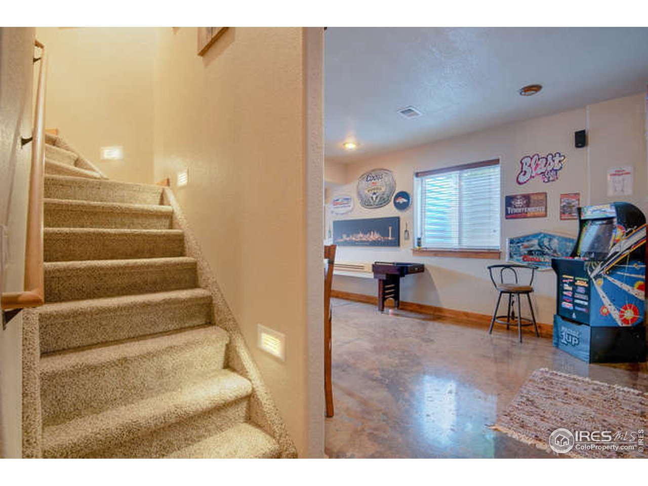 1441 Shelby Drive Berthoud, CO 80513 - Photo 35 of 40 a view of a livingroom with furniture and windows