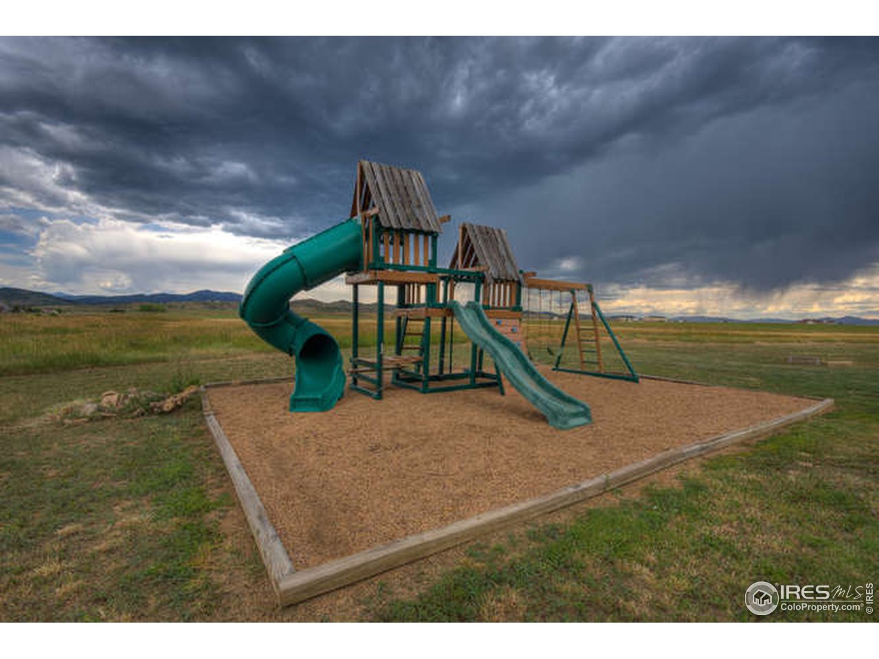 1441 Shelby Drive Berthoud, CO 80513 - Photo 37 of 40 a view of a house with a yard
