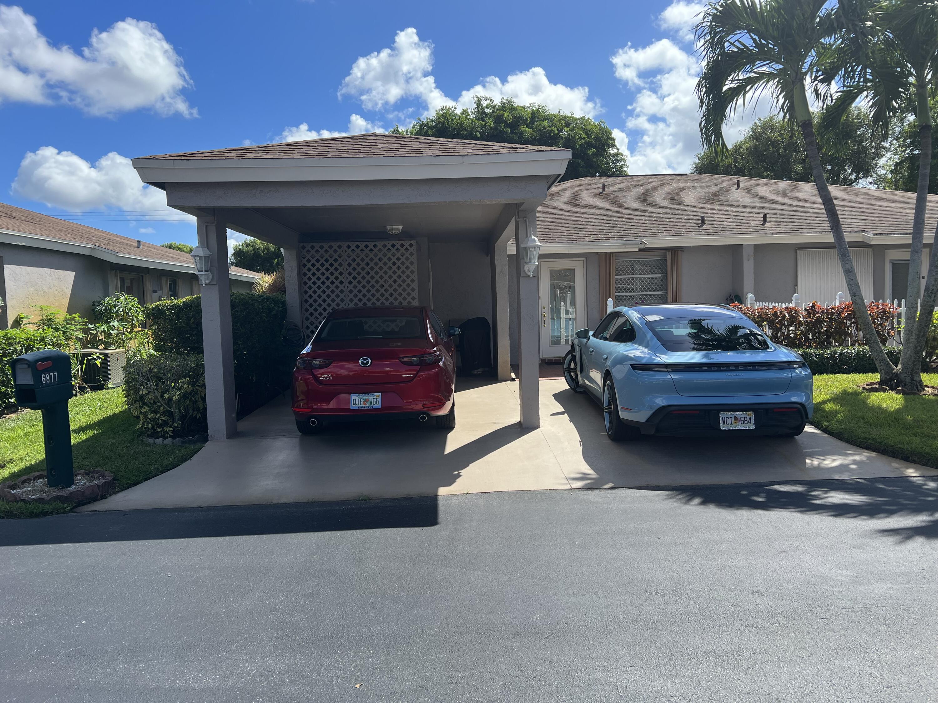 a car parked in front of a house