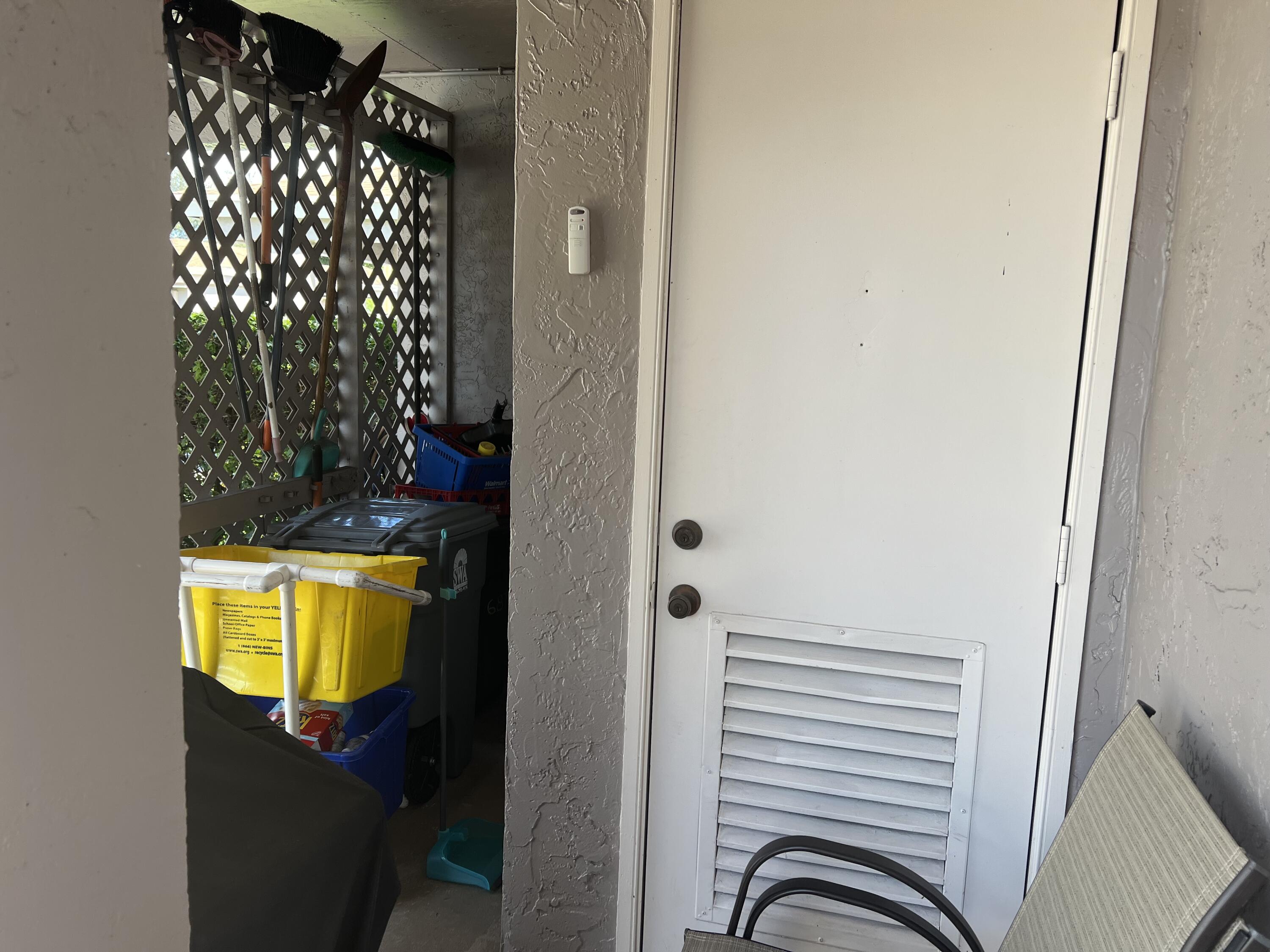 6877 Moonlit Drive Delray Beach, FL 33446 - Photo 21 of 45 a bathroom with a sink and a mirror