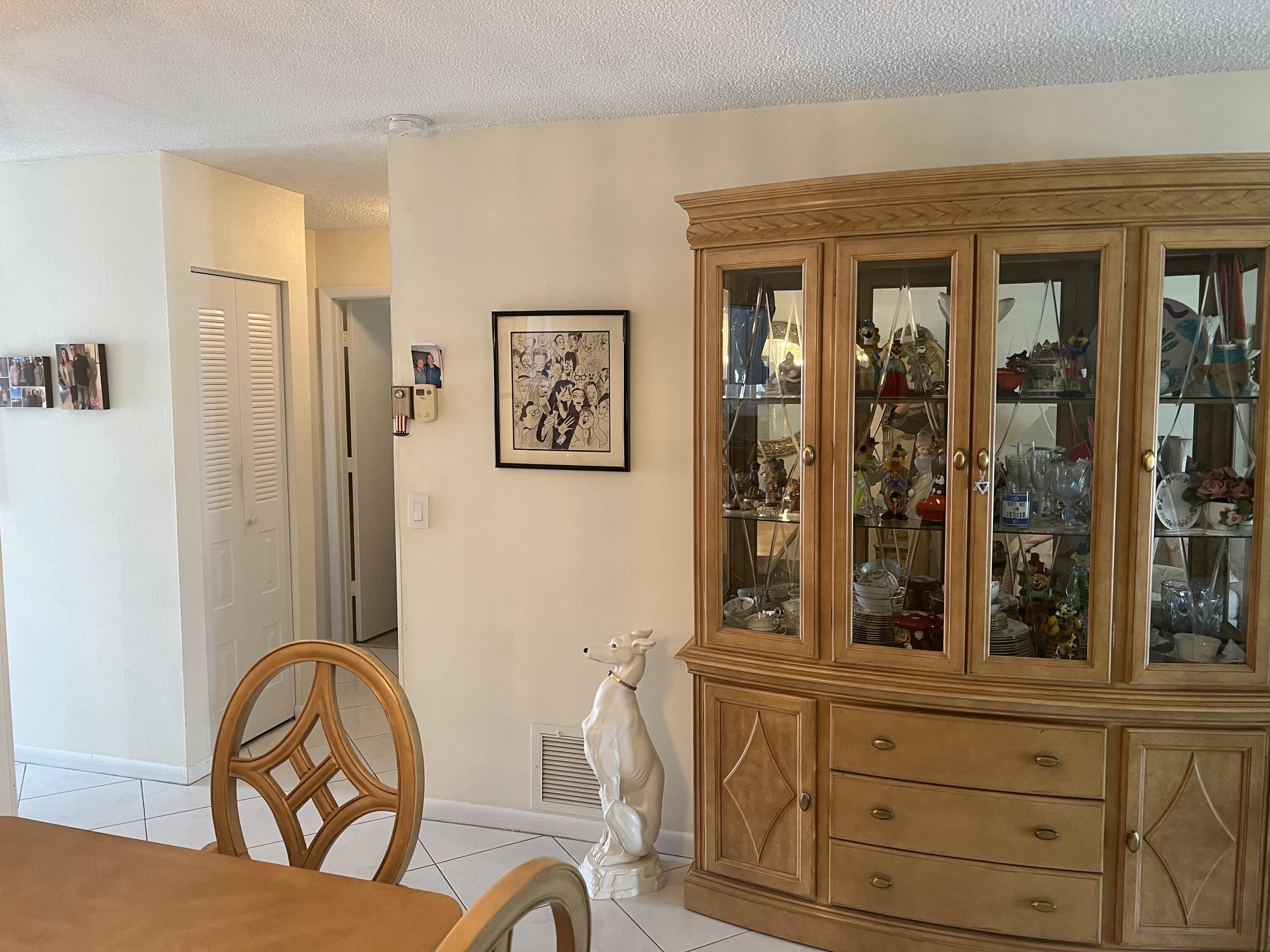 6877 Moonlit Drive Delray Beach, FL 33446 - Photo 26 of 45 a view of a door and chair front of house