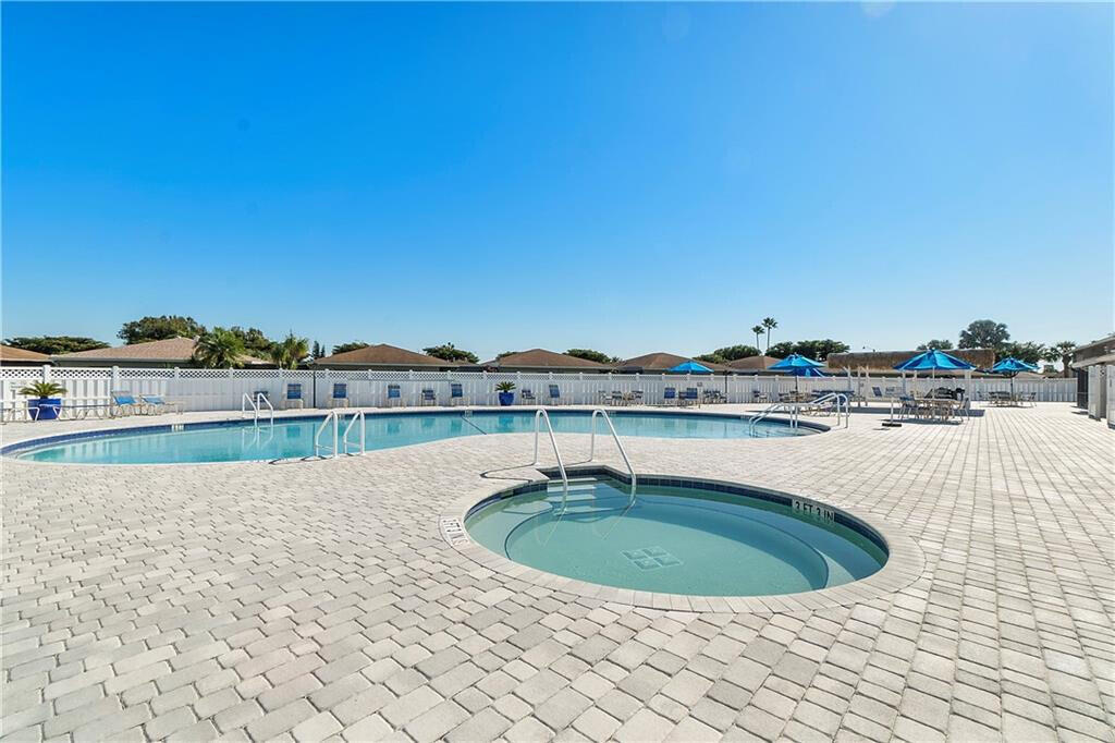 6877 Moonlit Drive Delray Beach, FL 33446 - Photo 39 of 45 a view of a swimming pool and an outdoor space