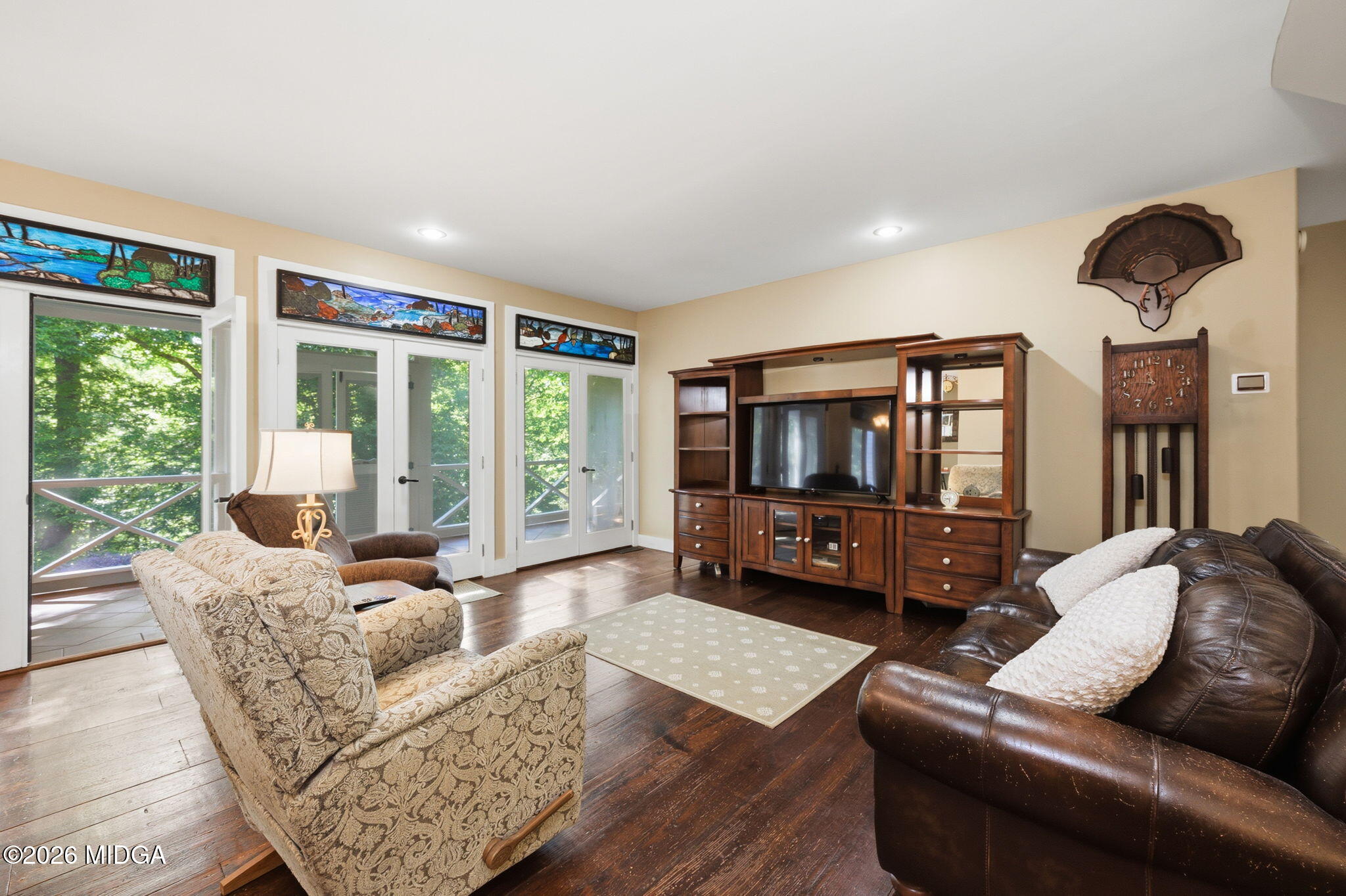 4686 Johnstonville Road Forsyth, GA 31029 - Photo 8 of 34 a living room with furniture and a large window