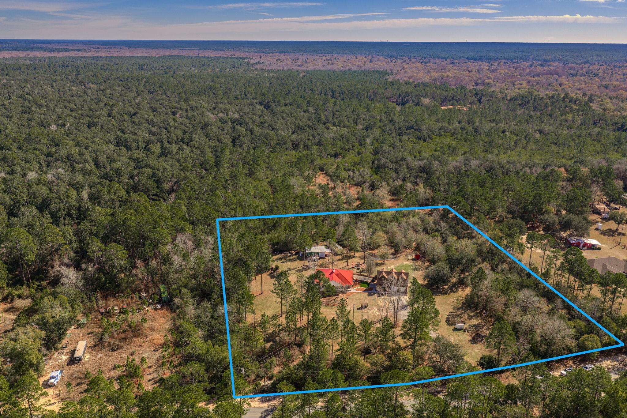 4398 Wilkerson Bluff Road Holt, FL 32564 - Photo 2 of 110 a view of a balcony with an outdoor space