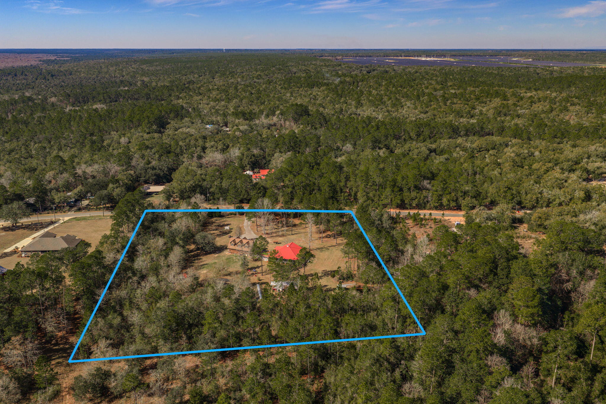4398 Wilkerson Bluff Road Holt, FL 32564 - Photo 3 of 110 18-web-or-mls-DJI_20260128110044_0392_D-
