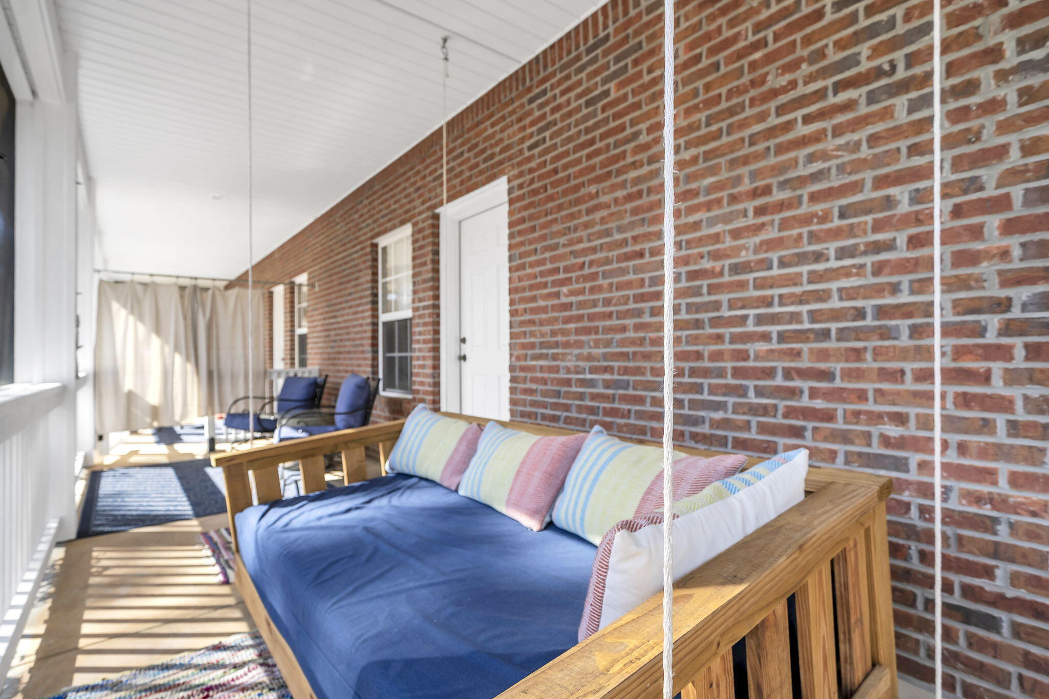 4398 Wilkerson Bluff Road Holt, FL 32564 - Photo 44 of 110 a living room with furniture and a large window