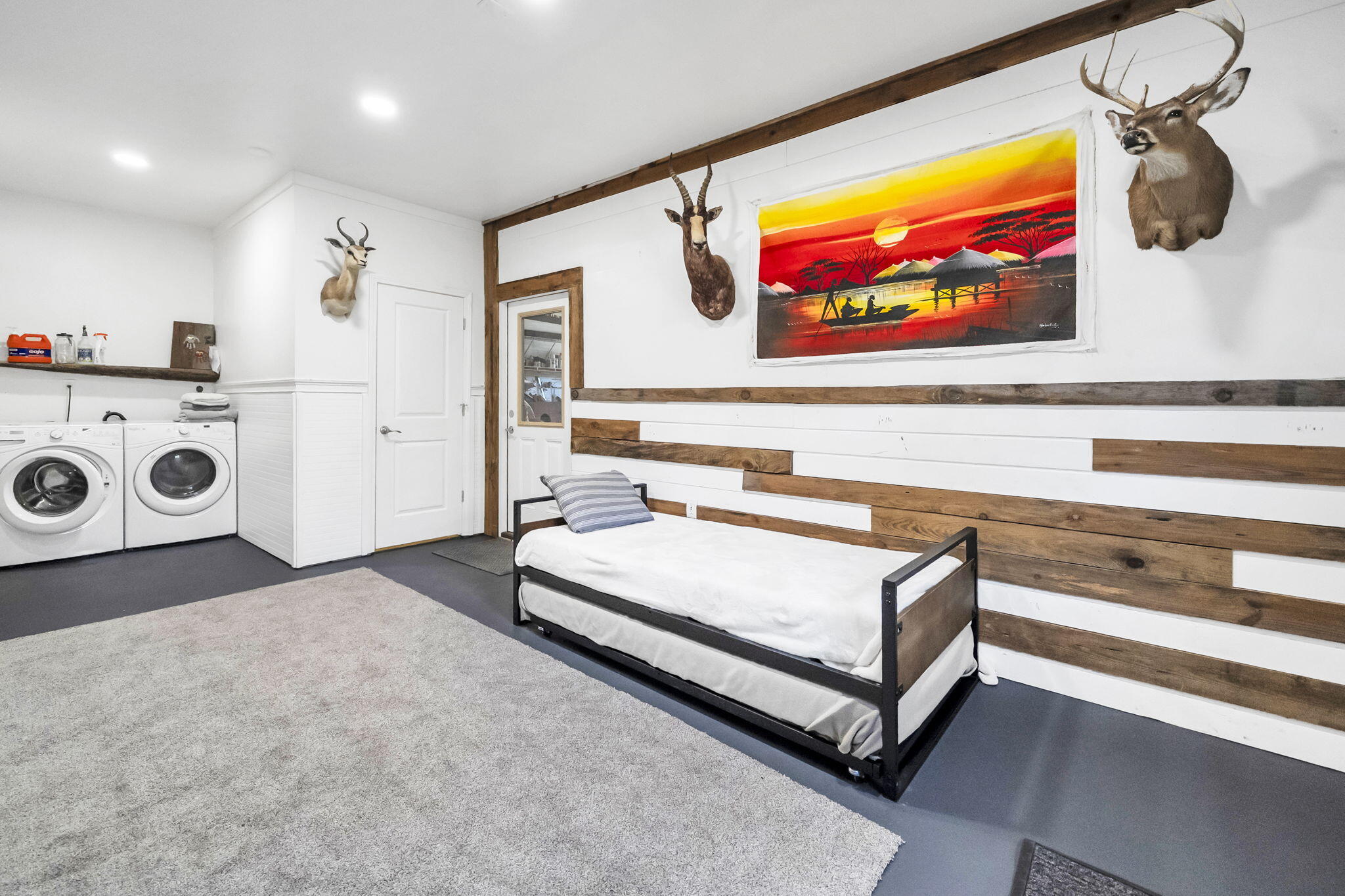 4398 Wilkerson Bluff Road Holt, FL 32564 - Photo 51 of 110 a living room with furniture and wall paintings