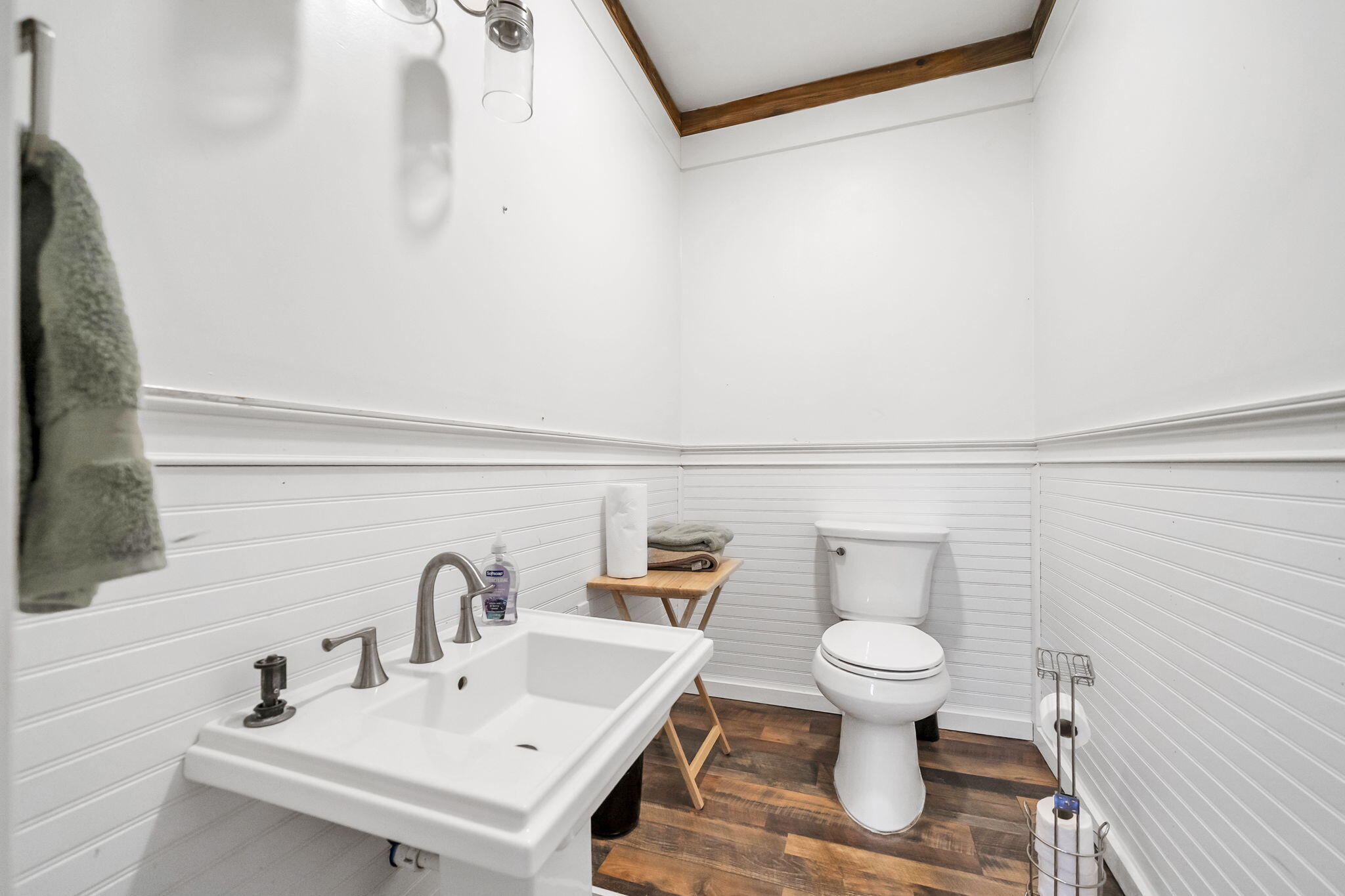 4398 Wilkerson Bluff Road Holt, FL 32564 - Photo 56 of 110 a bathroom with a sink a toilet and a mirror