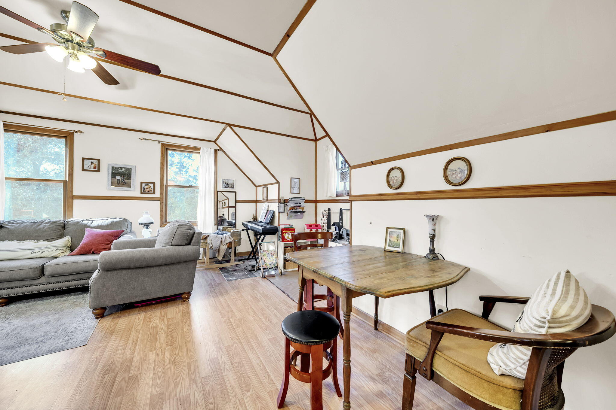 4398 Wilkerson Bluff Road Holt, FL 32564 - Photo 59 of 110 a living room with furniture and a wooden floor