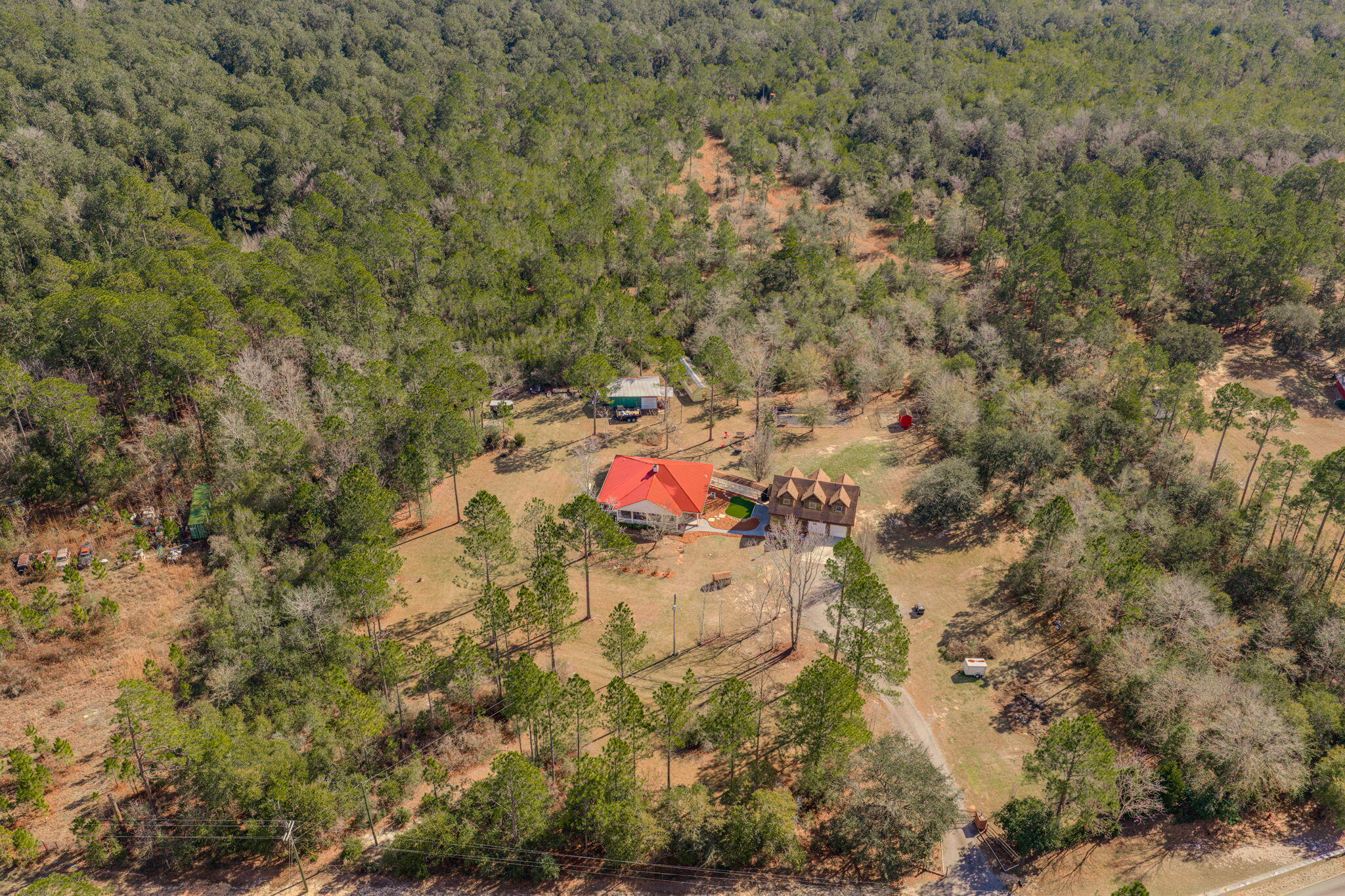 4398 Wilkerson Bluff Road Holt, FL 32564 - Photo 7 of 110 a view of outdoor space and covered with trees