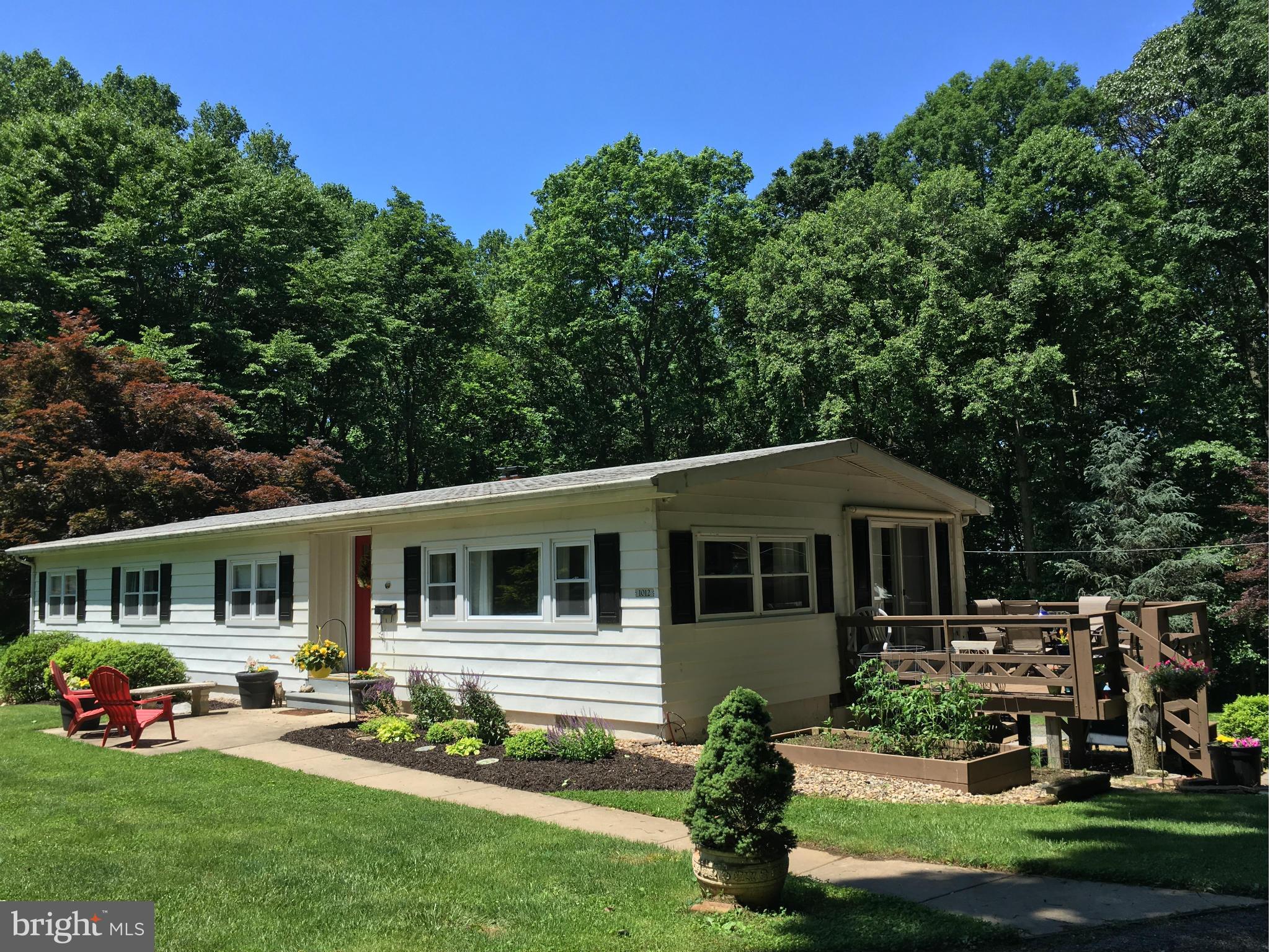 1012 Vale Road Bel Air, MD 21014 - Photo 1 of 27 a front view of a house with a garden