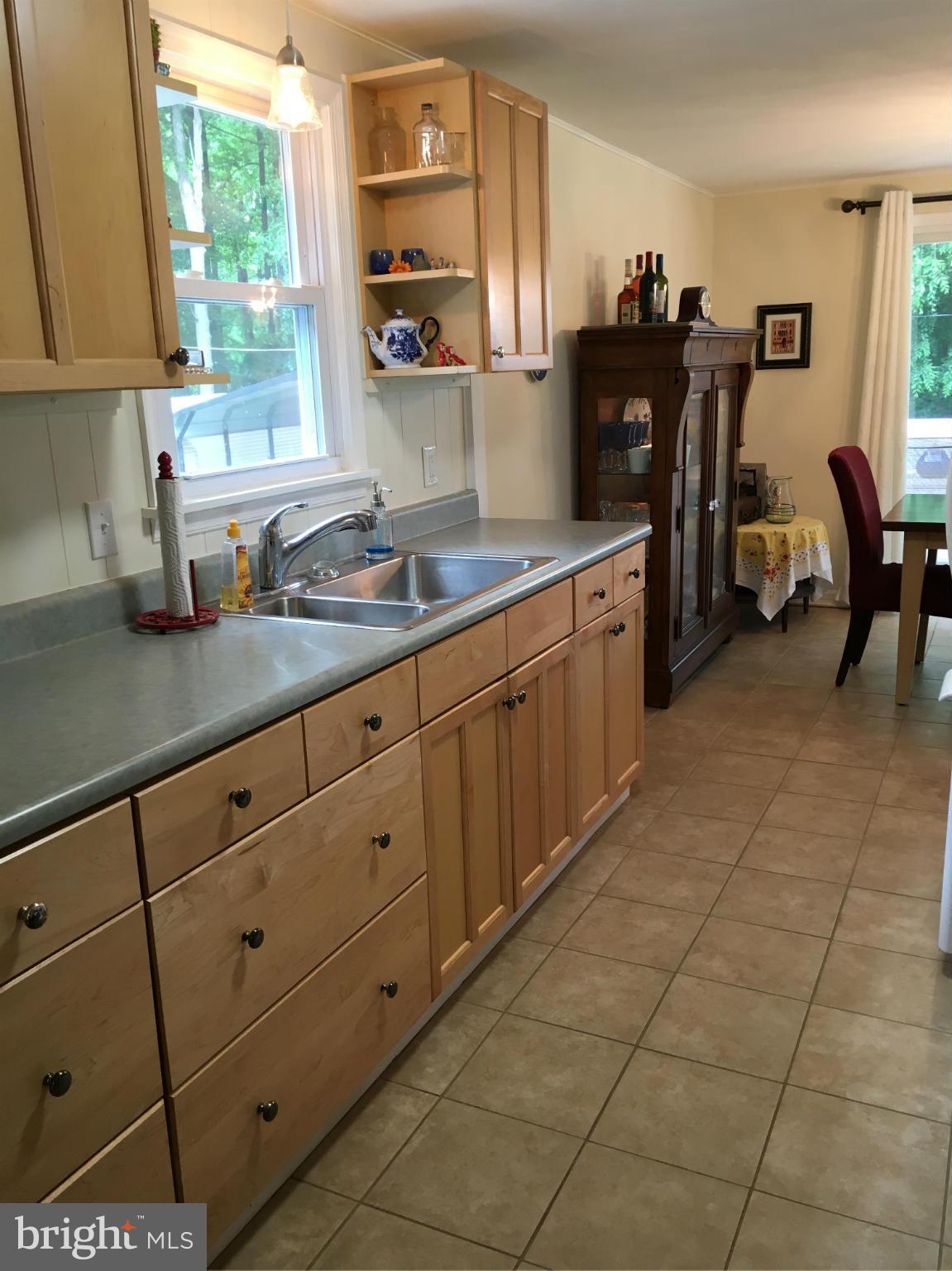 1012 Vale Road Bel Air, MD 21014 - Photo 13 of 27 a kitchen with cabinets and window